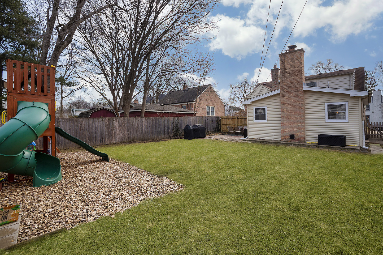 2132 Illinois Road Northbrook, IL 60062 - Photo 23 of 26 a front view of house with yard and green space