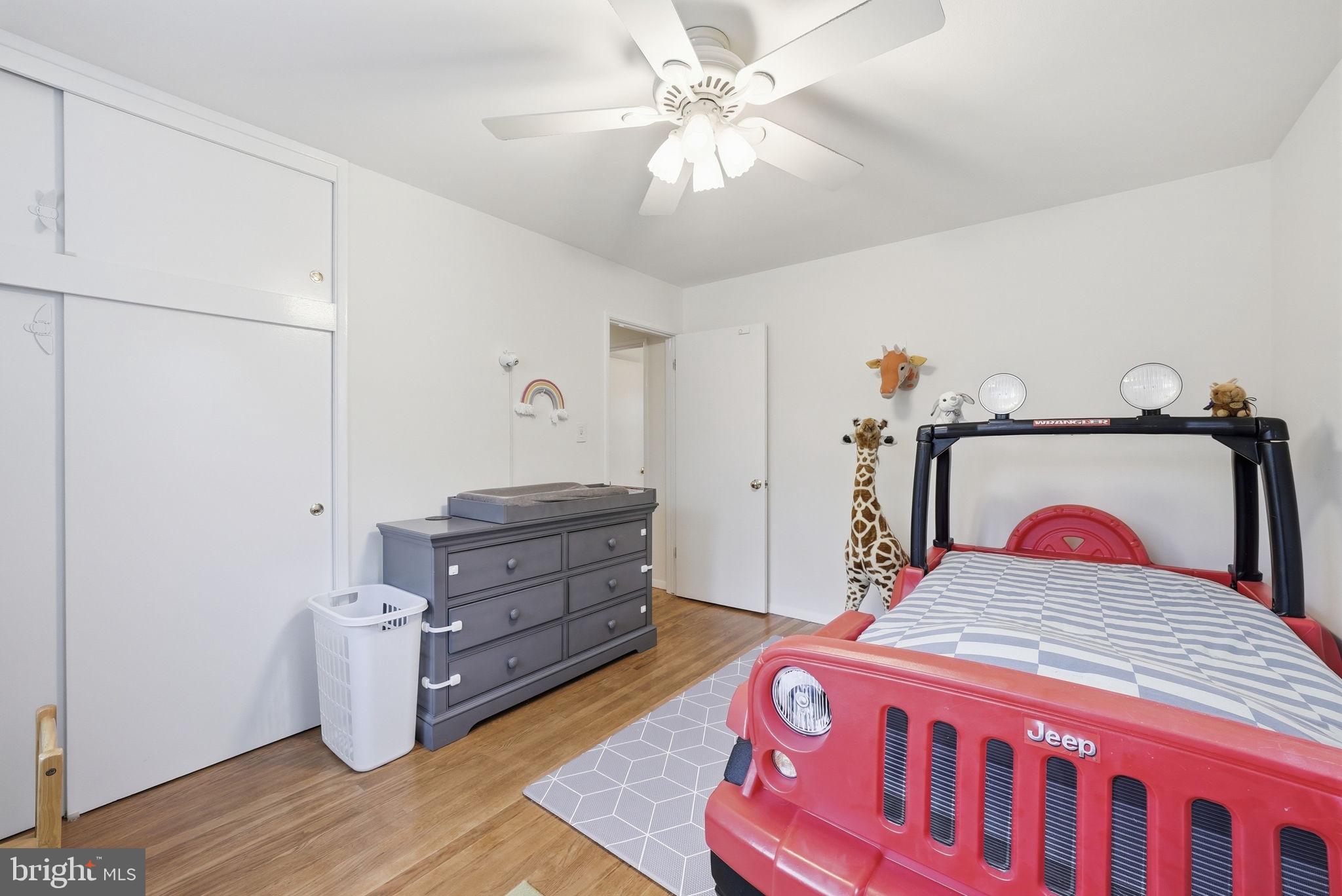 4616 Exeter Street Annandale, VA 22003 - Photo 28 of 36 a bedroom with a bed and a dresser