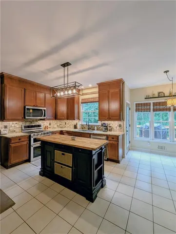 $569,000 | 1581 Shetland Pony Court Northwest, Suwanee, GA 30024