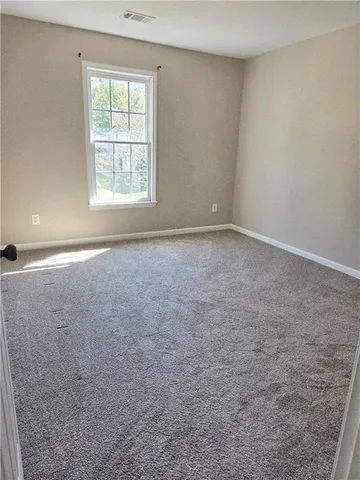 a view of a porch with furniture