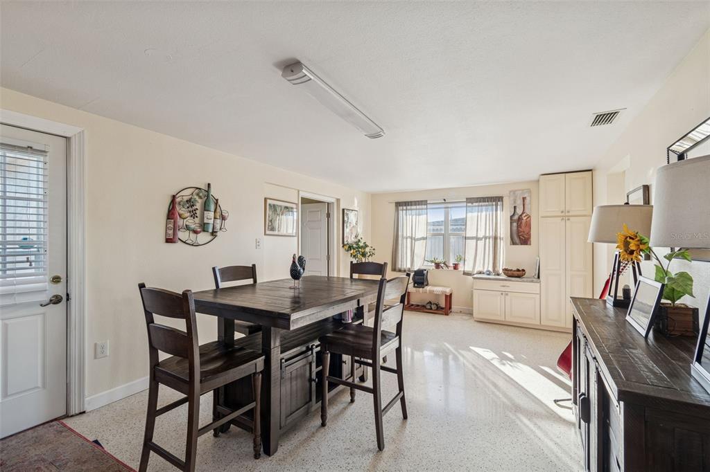 4940 Picture Avenue Holiday, FL 34690 - Photo 13 of 37 a view of a dining room with furniture