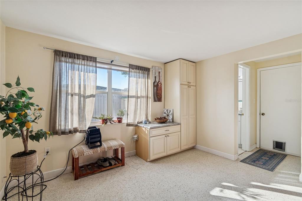 4940 Picture Avenue Holiday, FL 34690 - Photo 17 of 37 a living room with furniture and a large window