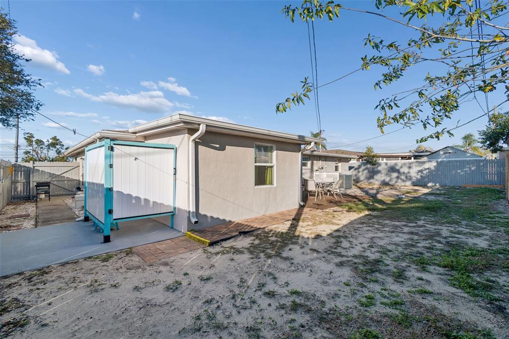 4940 Picture Avenue Holiday, FL 34690 - Photo 30 of 37 a view of a house with a yard
