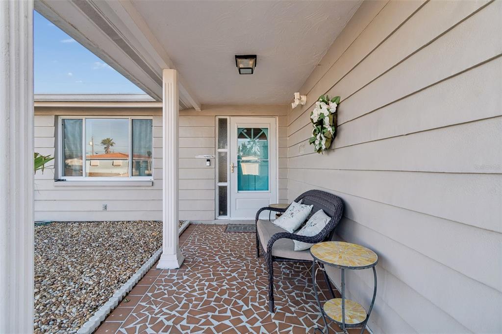 4940 Picture Avenue Holiday, FL 34690 - Photo 3 of 37 a living room with furniture and a rug