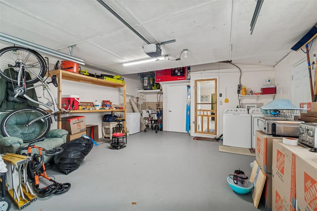 4940 Picture Avenue Holiday, FL 34690 - Photo 34 of 37 a utility room with lot of items