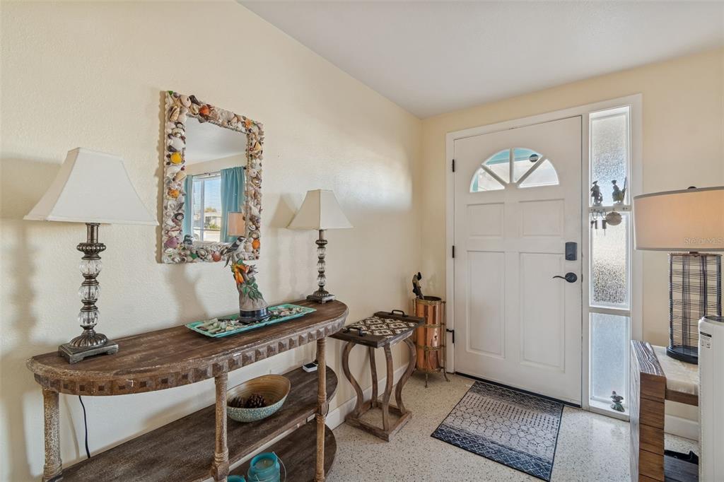 4940 Picture Avenue Holiday, FL 34690 - Photo 4 of 37 a living room with furniture and a window