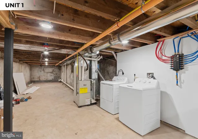 a view of storage and utility room with a sink