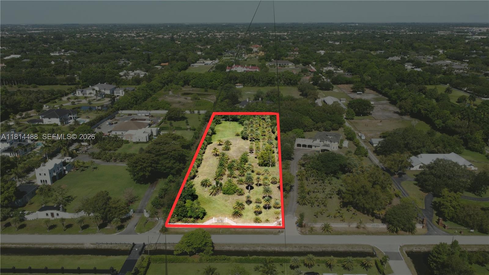 5533 Southwest 136th Avenue Southwest Ranches, FL 33330 - Photo 3 of 4 an aerial view of residential houses with outdoor space