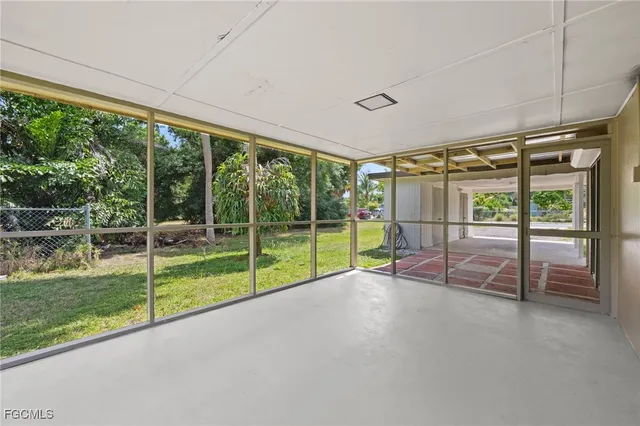 a view of empty room with sliding glass door