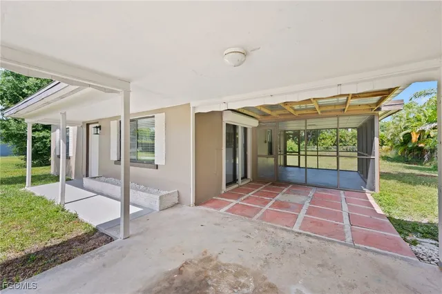a backyard of a house with seating space