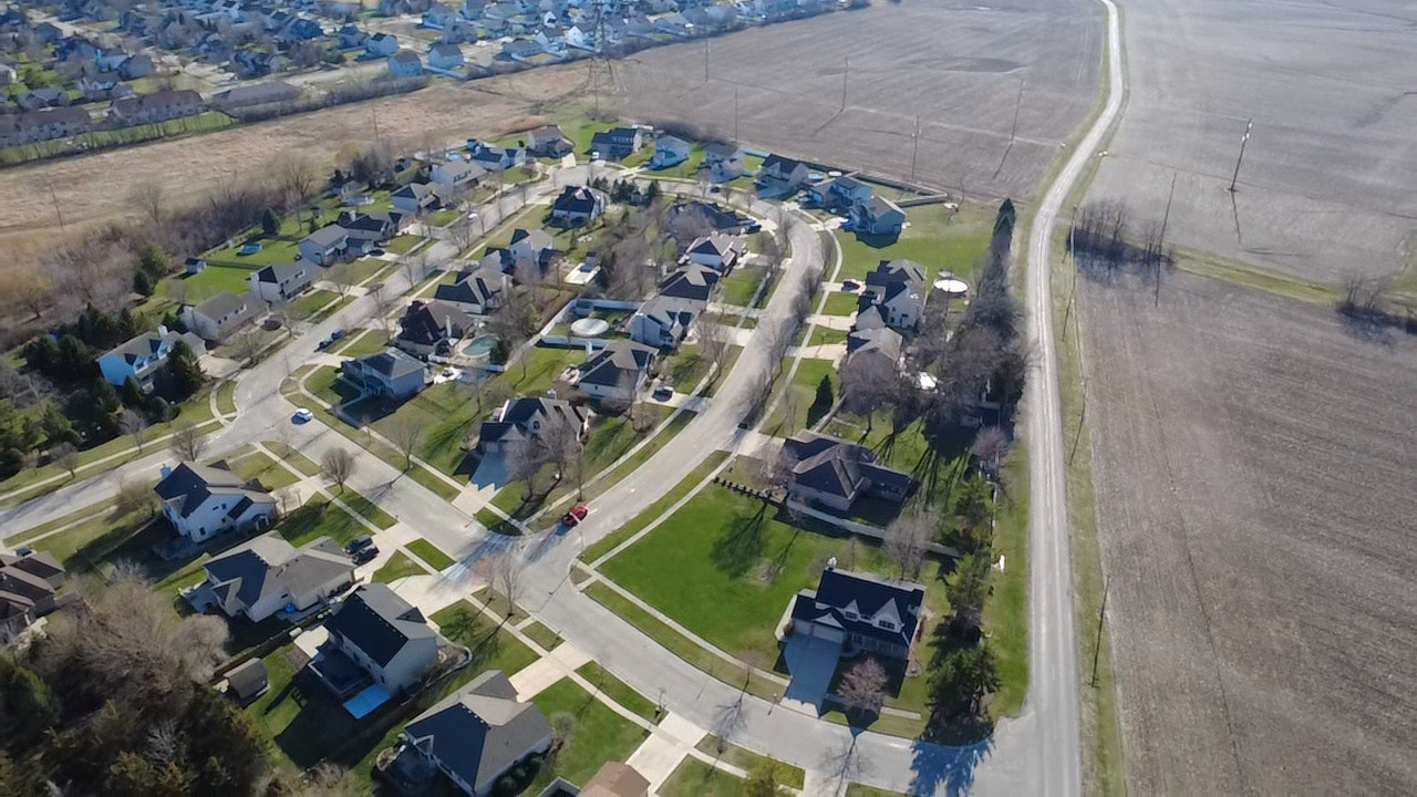 26124 Rachael Drive Channahon, IL 60410 - Photo 5 of 16 an aerial view of houses with outdoor space