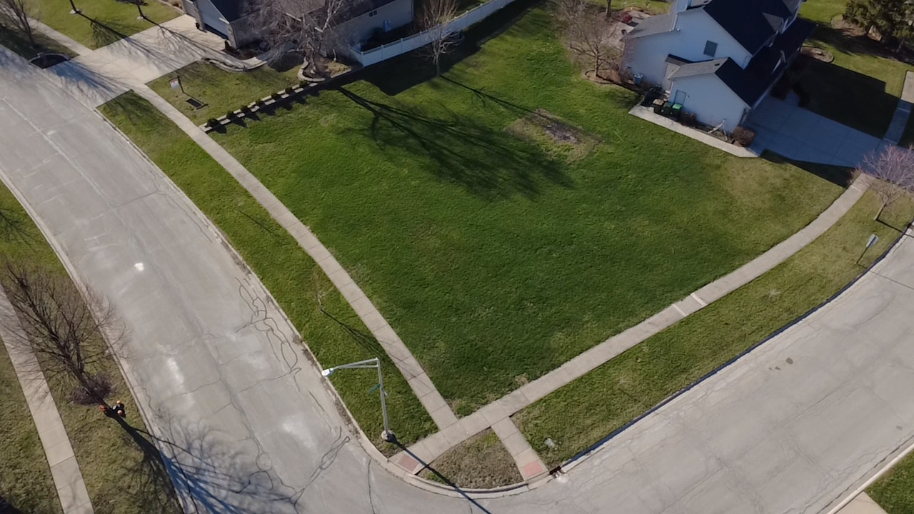 26124 Rachael Drive Channahon, IL 60410 - Photo 9 of 16 a view of a backyard with outdoor area