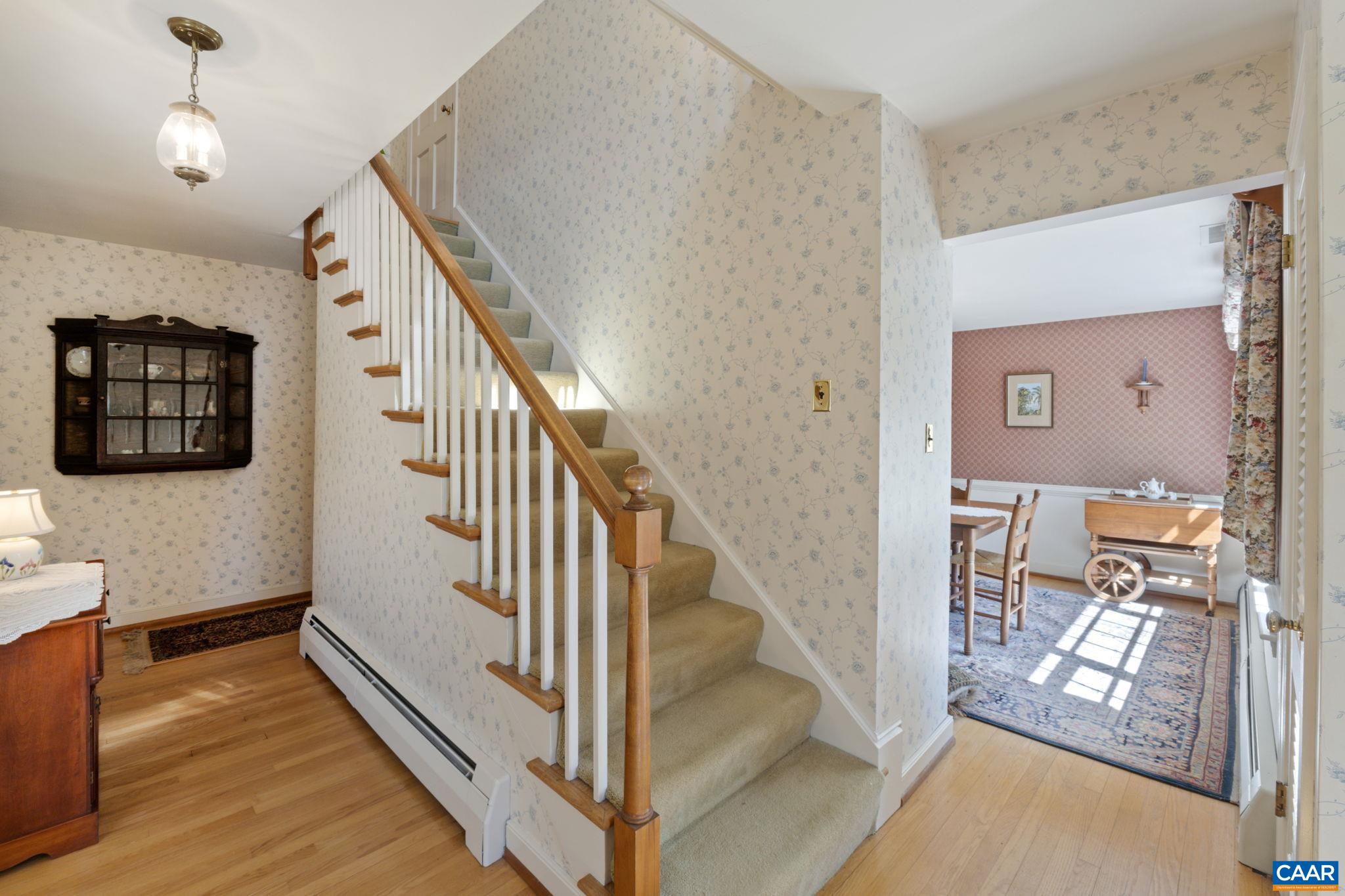 2507 Northfield Road Charlottesville, VA 22901 - Photo 11 of 68 a view of a hallway with wooden floor and staircase