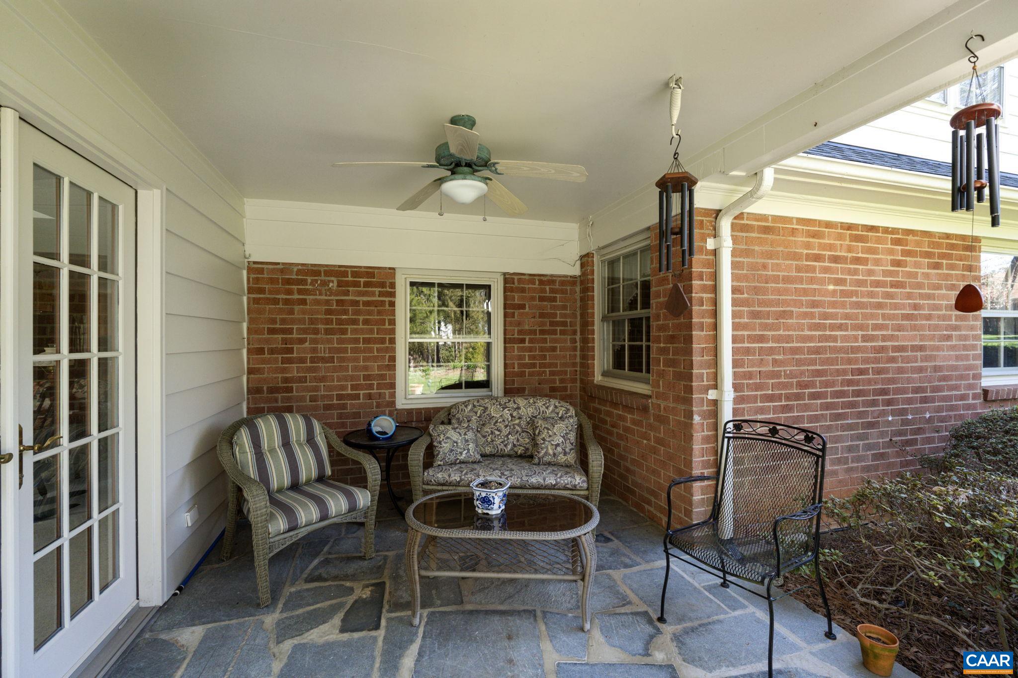 2507 Northfield Road Charlottesville, VA 22901 - Photo 20 of 68 a balcony with furniture and a potted plant