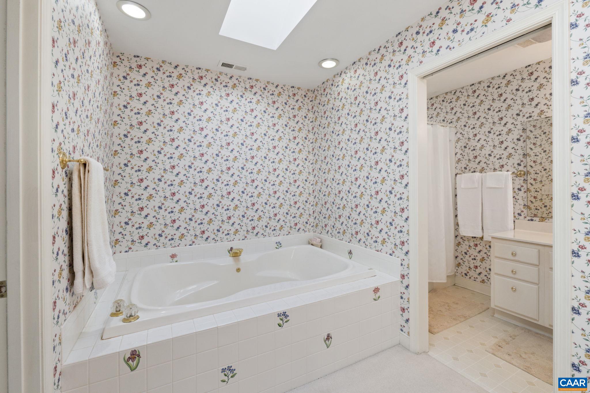 2507 Northfield Road Charlottesville, VA 22901 - Photo 30 of 68 a bathroom with a bathtub and shower