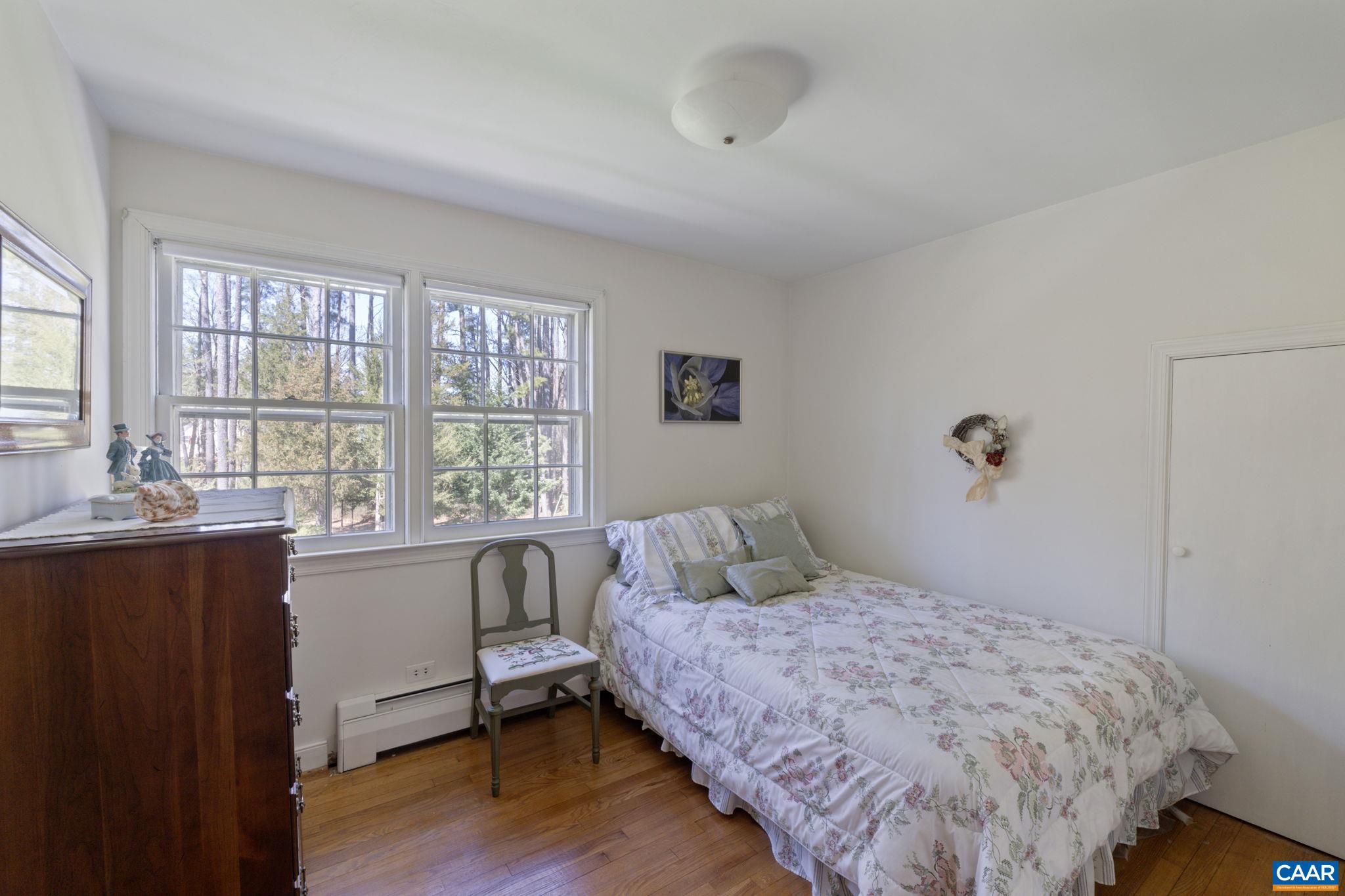 2507 Northfield Road Charlottesville, VA 22901 - Photo 41 of 68 a bedroom with a bed and a large window