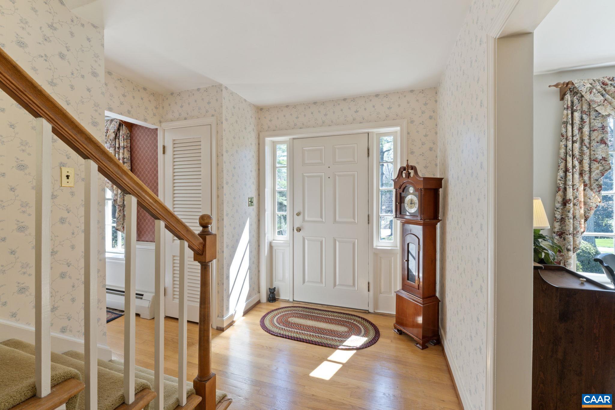 2507 Northfield Road Charlottesville, VA 22901 - Photo 6 of 68 a view of entryway with wooden floor and stairs
