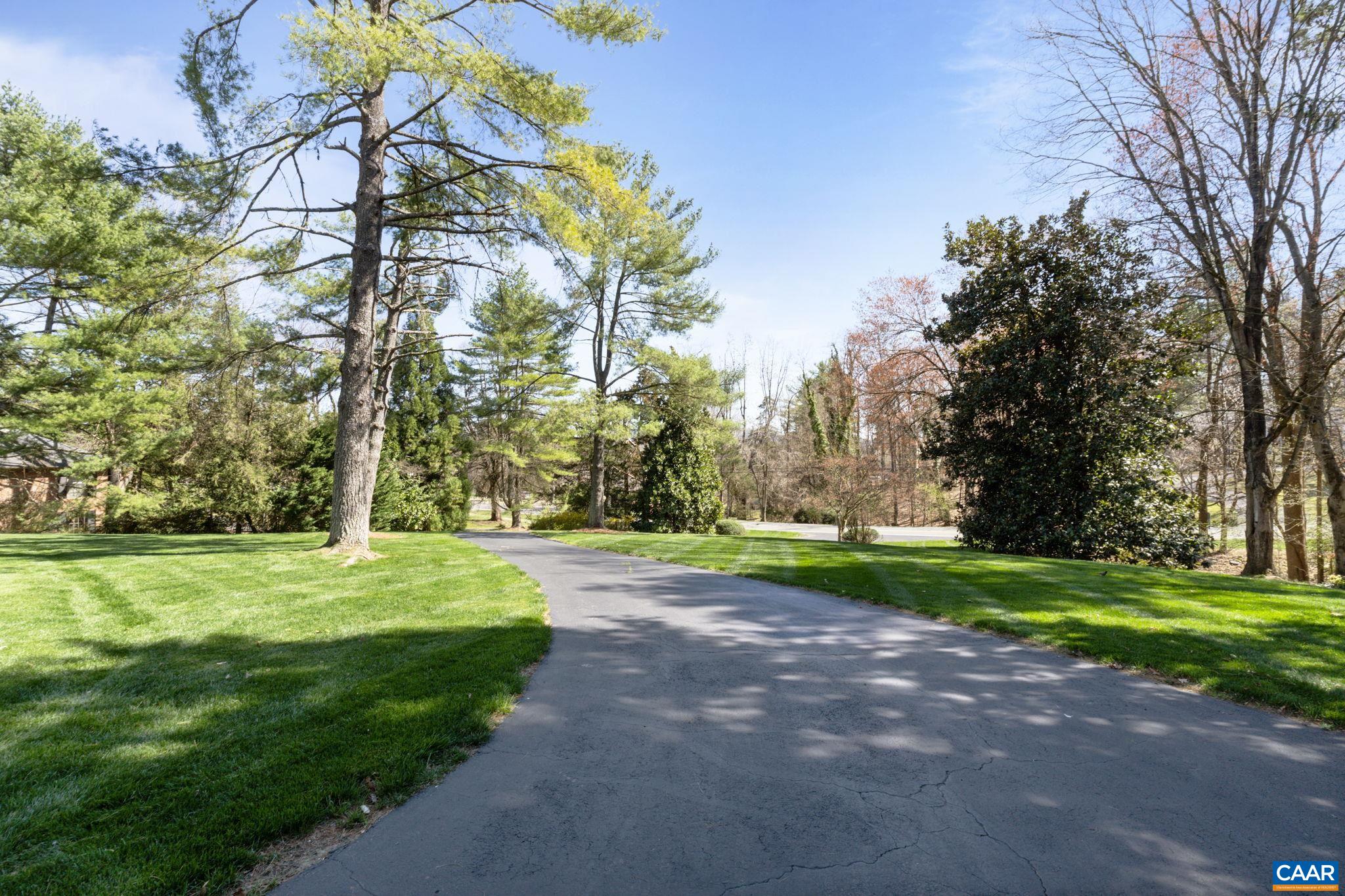2507 Northfield Road Charlottesville, VA 22901 - Photo 62 of 68 a big yard with lots of trees in the background