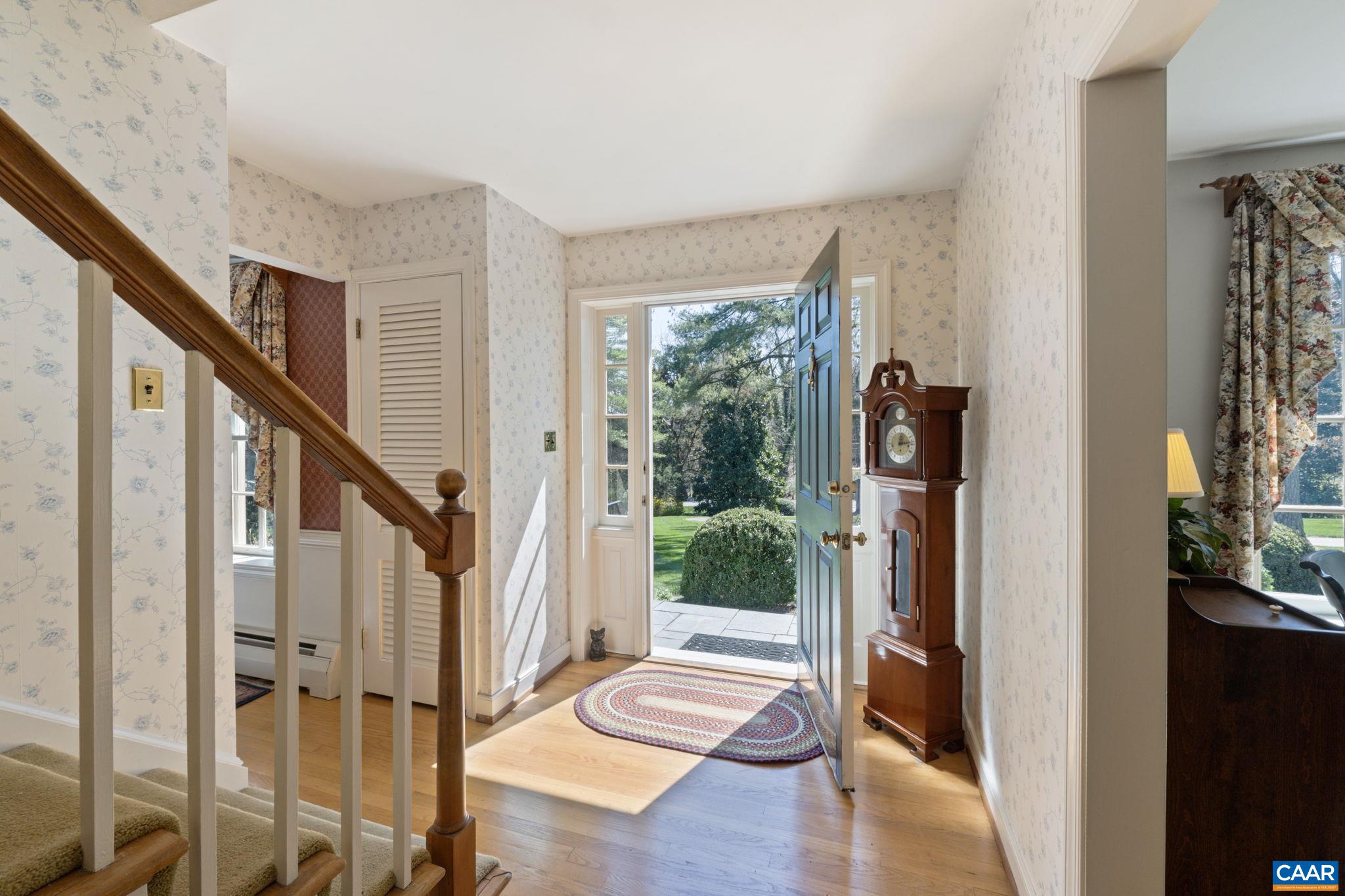 2507 Northfield Road Charlottesville, VA 22901 - Photo 7 of 68 a view of an entryway with wooden floor and front door