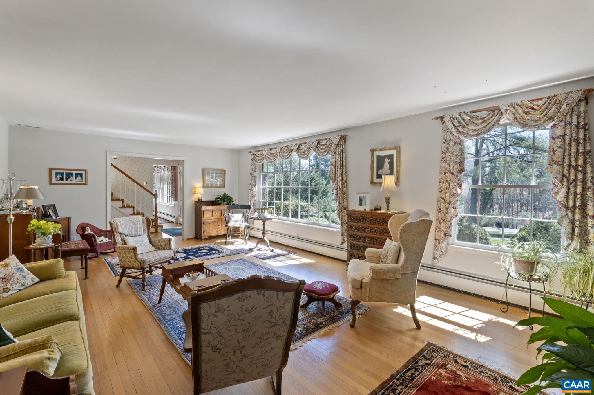 2507 Northfield Road Charlottesville, VA 22901 - Photo 10 of 68 a living room with furniture and large windows
