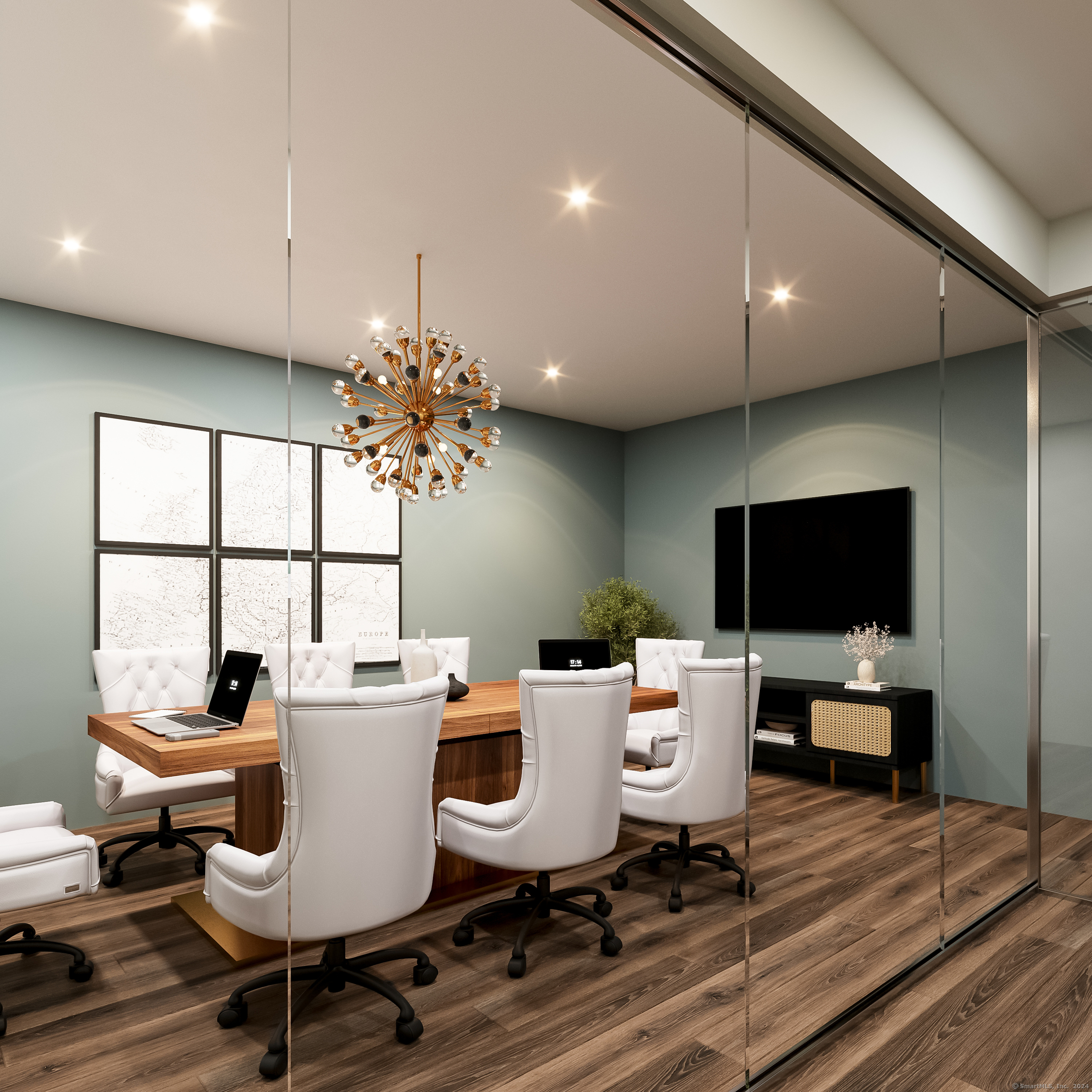 100 North Main Street, Unit 103 Bristol, CT 06010 - Photo 10 of 10 a work room with furniture and a flat screen tv