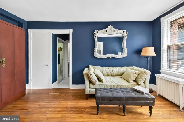 a bedroom with a bed and furniture