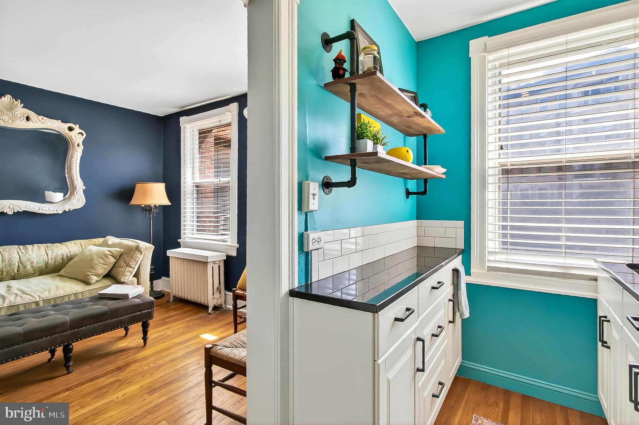 3600 Connecticut Avenue Northwest, Unit 105 Washington, DC 20008 - Photo 20 of 55 a living room with furniture and a flat screen tv