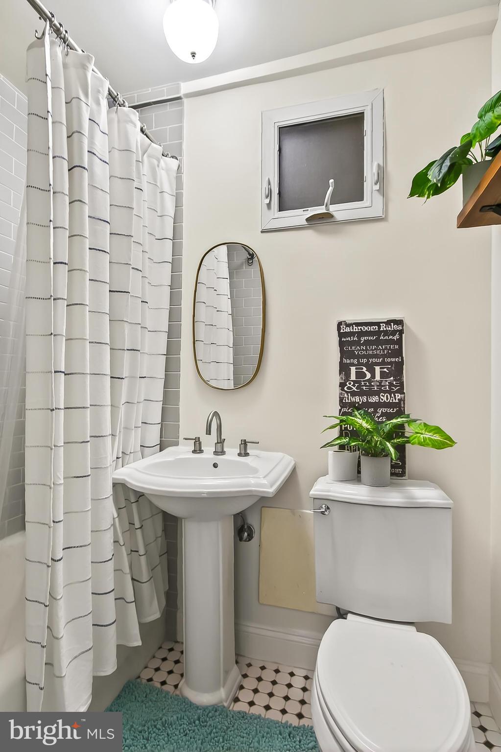 3600 Connecticut Avenue Northwest, Unit 105 Washington, DC 20008 - Photo 24 of 55 a bathroom with a toilet sink and mirror