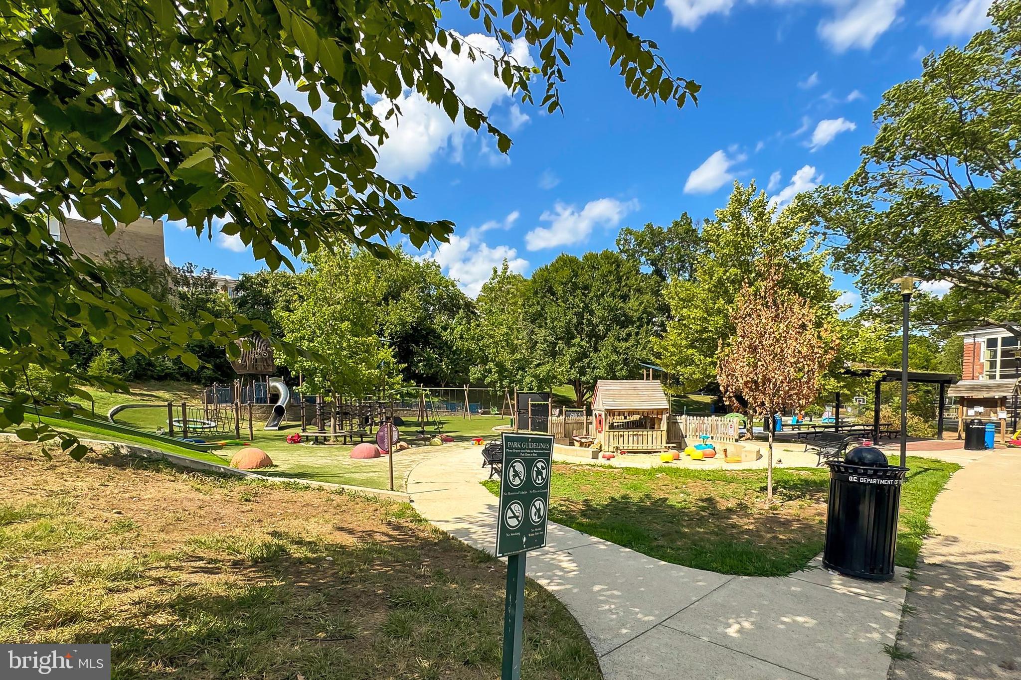 3600 Connecticut Avenue Northwest, Unit 105 Washington, DC 20008 - Photo 43 of 55 a front view of a house with a yard
