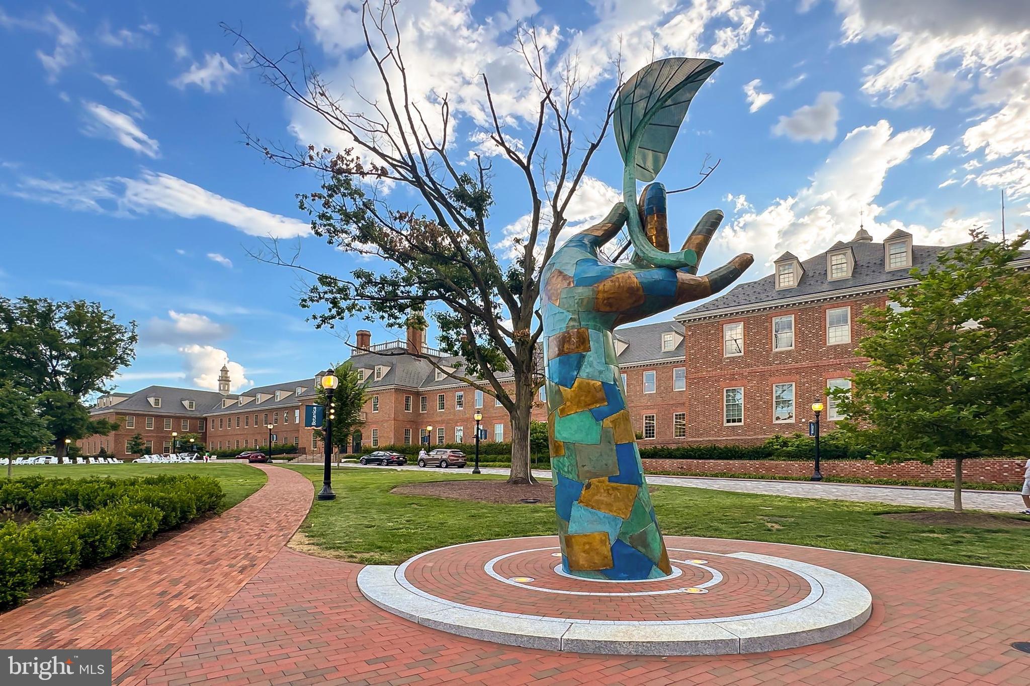 3600 Connecticut Avenue Northwest, Unit 105 Washington, DC 20008 - Photo 50 of 55 a front view of a house with a yard