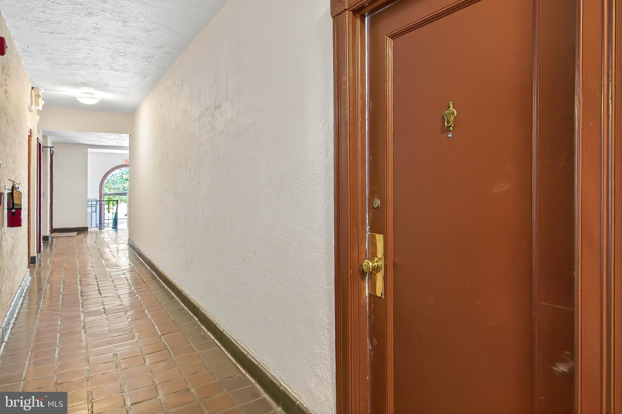 3600 Connecticut Avenue Northwest, Unit 105 Washington, DC 20008 - Photo 10 of 55 a view of a hallway with wooden floor