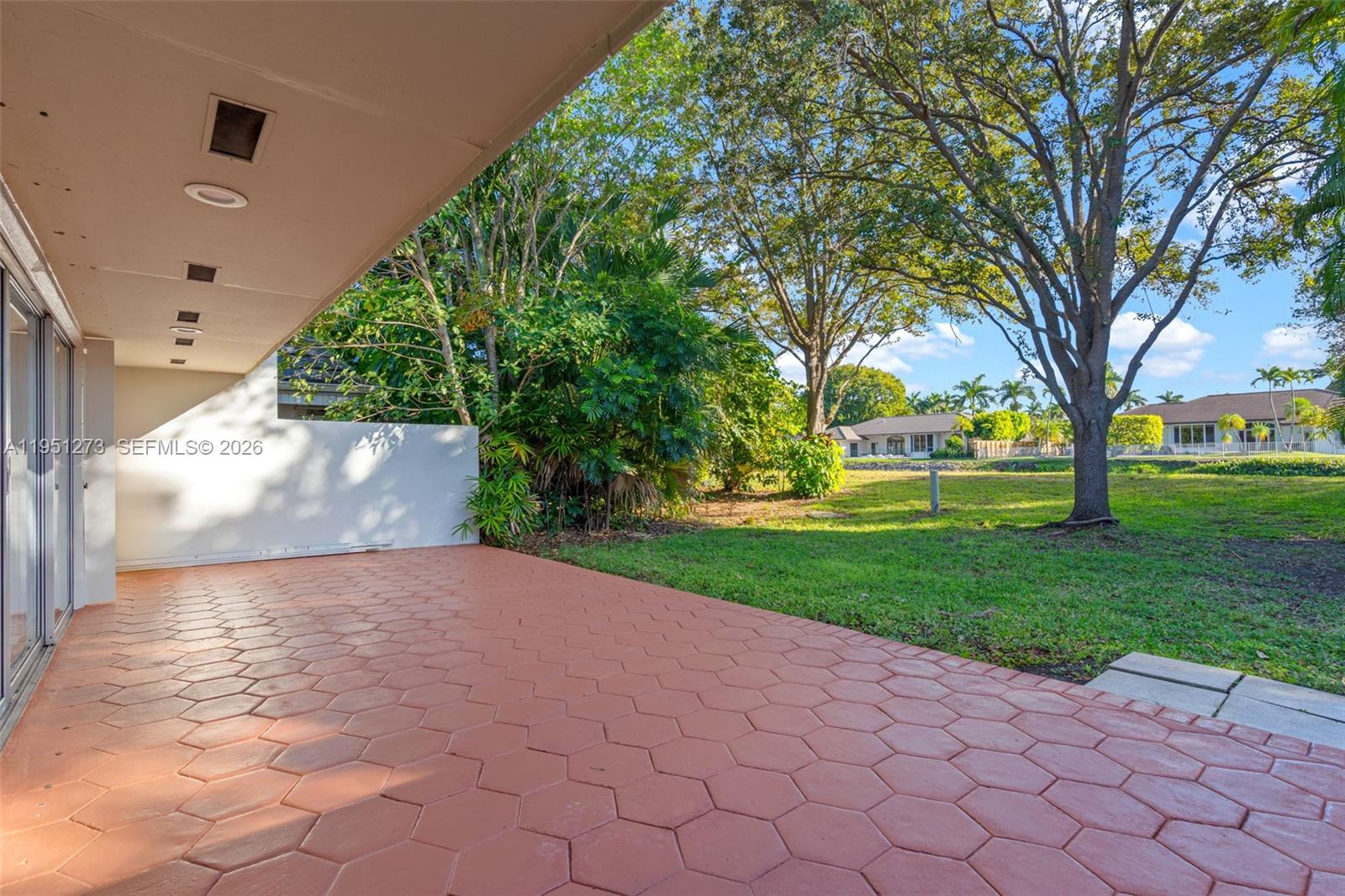 8134 Southwest 83rd Street Miami, FL 33143 - Photo 13 of 15 a view of a yard with plants and trees