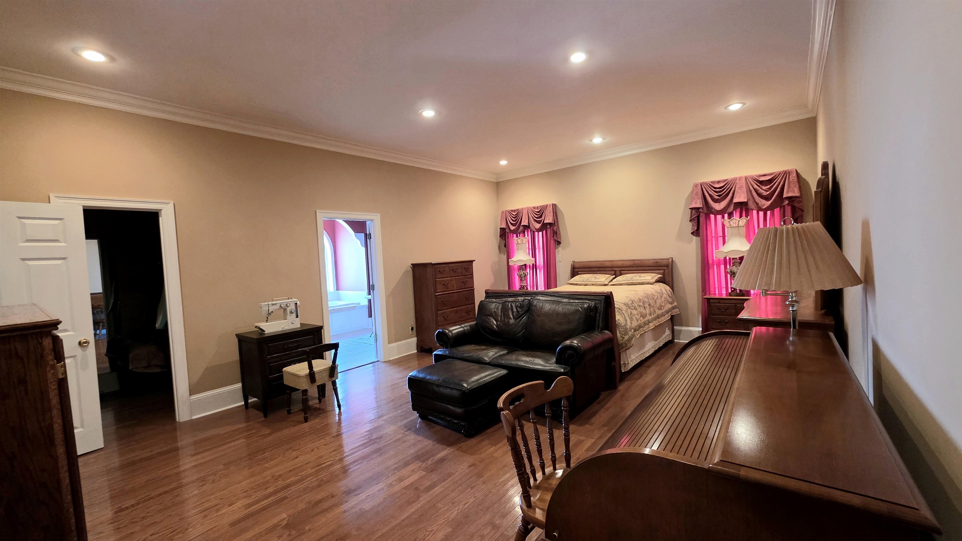 3070 Caney Branch Road Adamsville, TN 38310 - Photo 12 of 24 a living room with furniture and a flat screen tv