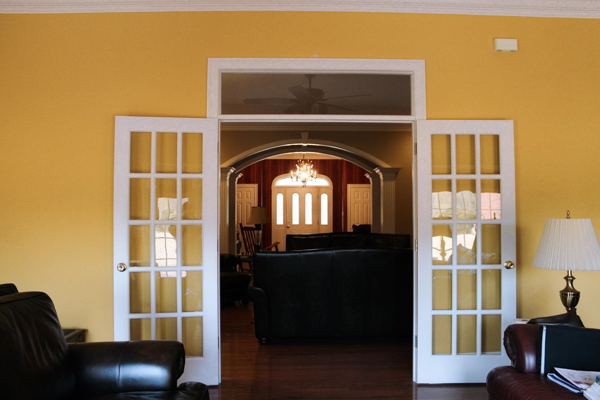 3070 Caney Branch Road Adamsville, TN 38310 - Photo 18 of 24 a living room with a fireplace furniture and a large window