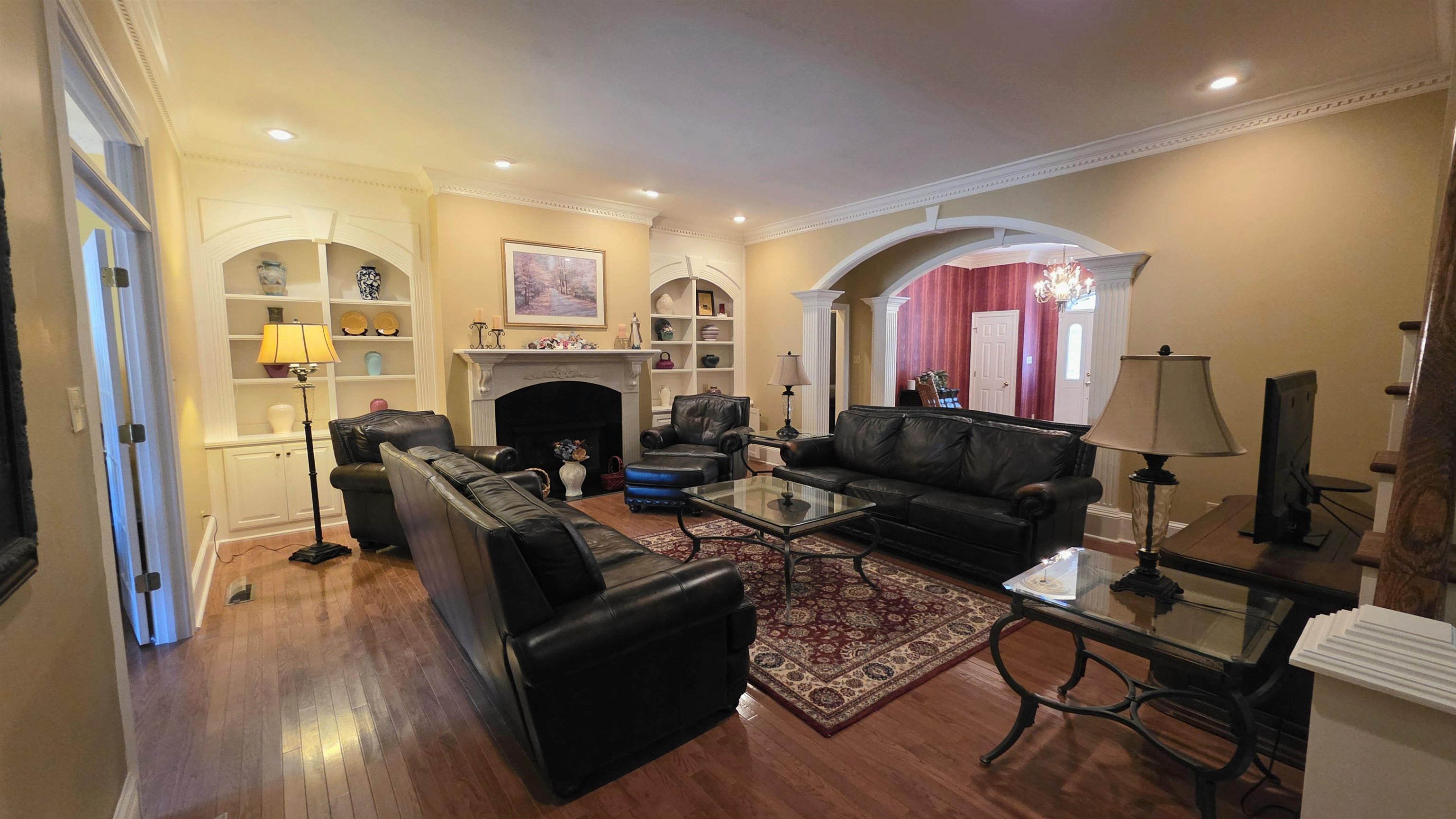 3070 Caney Branch Road Adamsville, TN 38310 - Photo 3 of 24 a living room with fireplace furniture and a fireplace