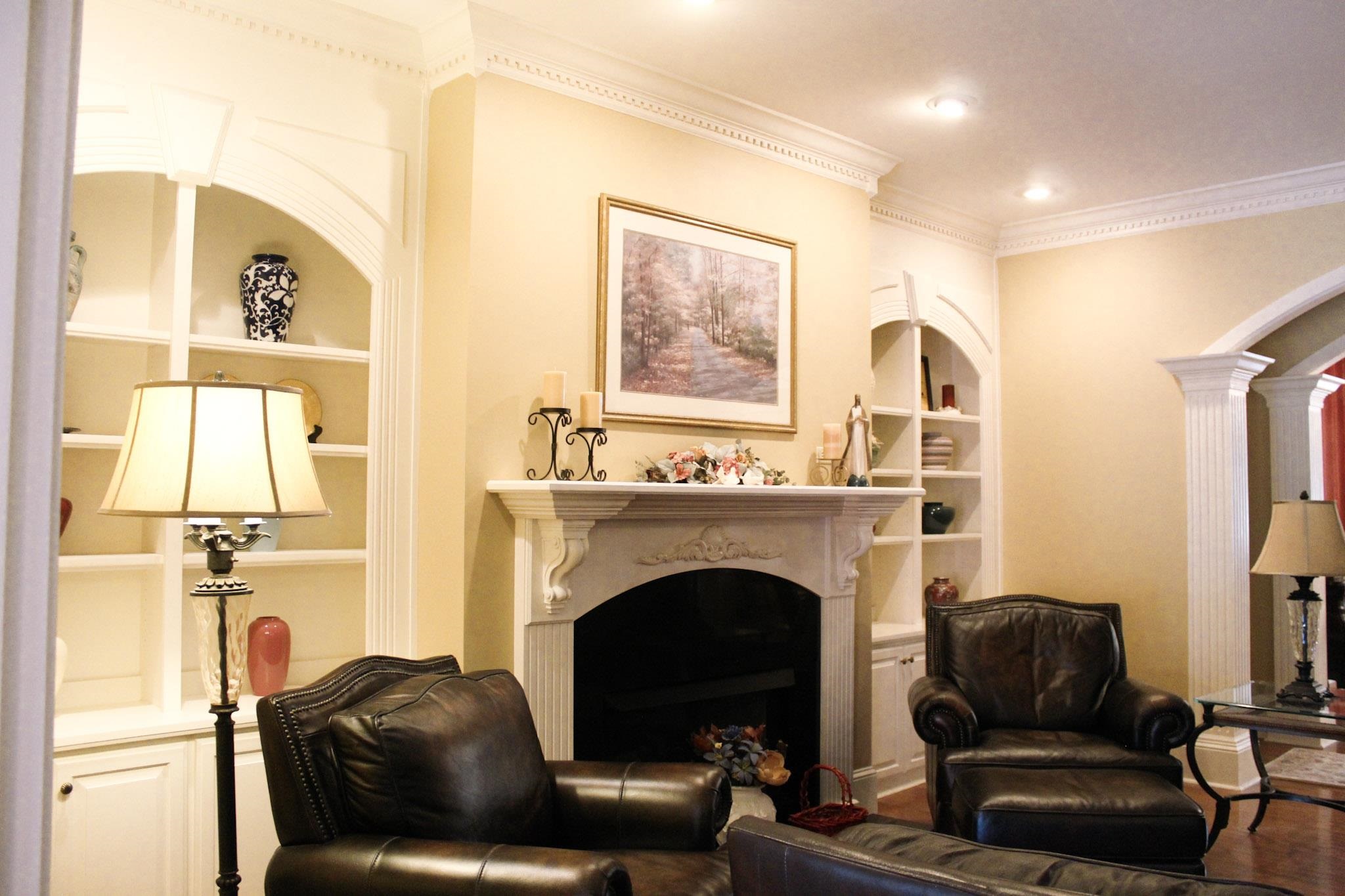 3070 Caney Branch Road Adamsville, TN 38310 - Photo 4 of 24 a living room with furniture and a fireplace