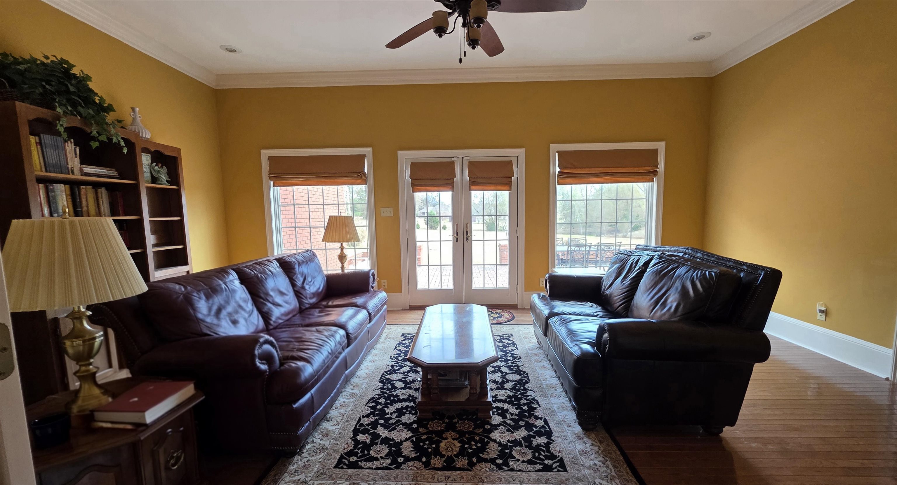 3070 Caney Branch Road Adamsville, TN 38310 - Photo 5 of 24 a living room with furniture fireplace and a window