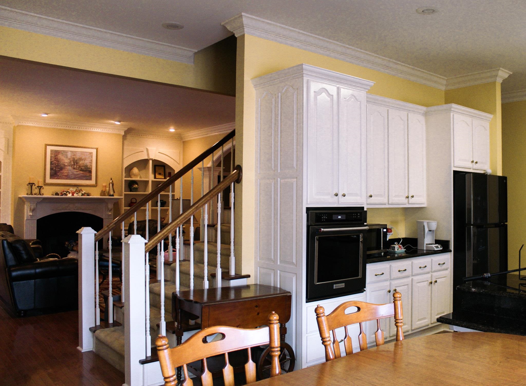 3070 Caney Branch Road Adamsville, TN 38310 - Photo 8 of 24 a kitchen with stainless steel appliances kitchen island granite countertop a refrigerator and a stove top oven
