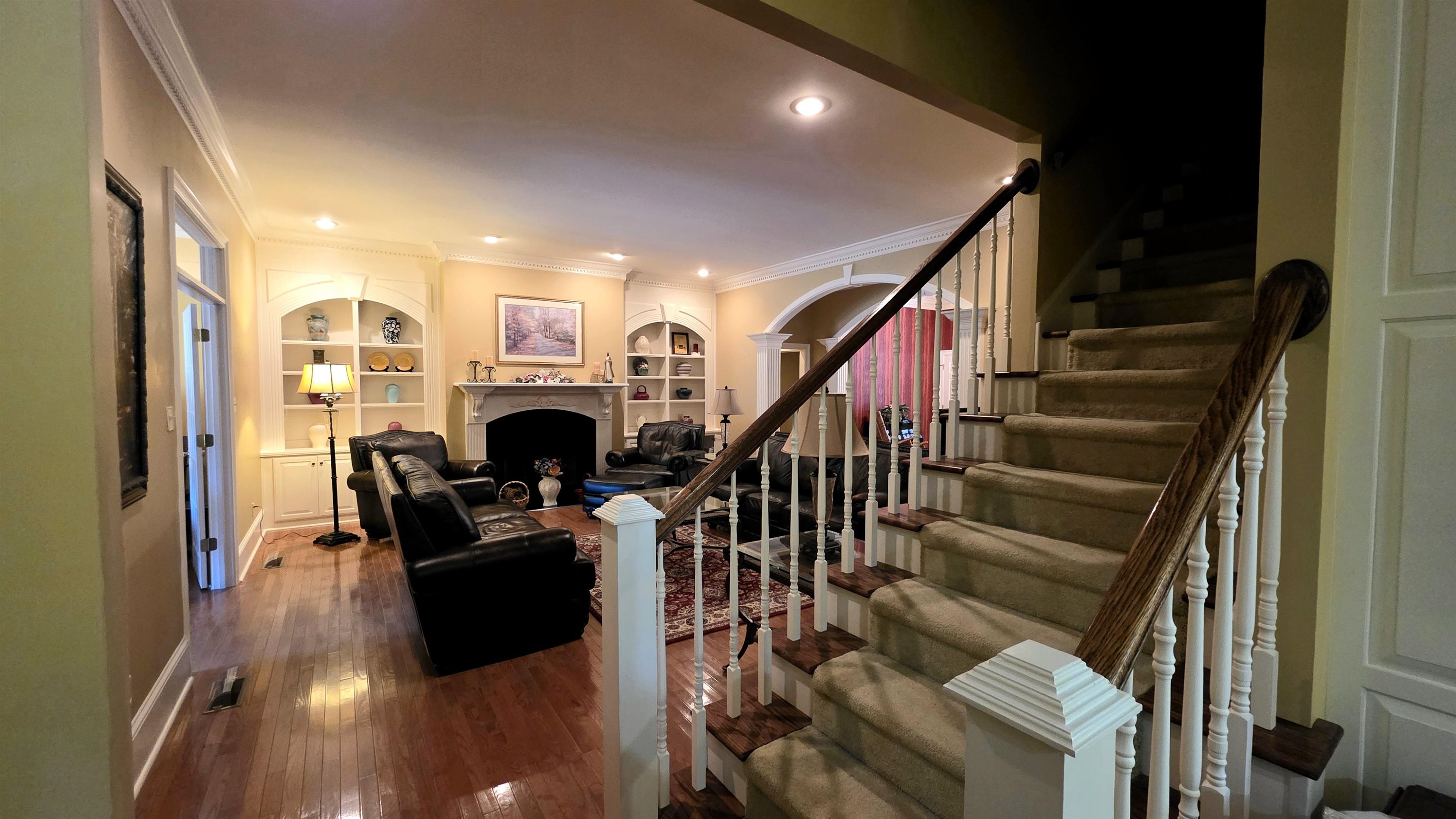 3070 Caney Branch Road Adamsville, TN 38310 - Photo 9 of 24 a view of living room with furniture and fireplace