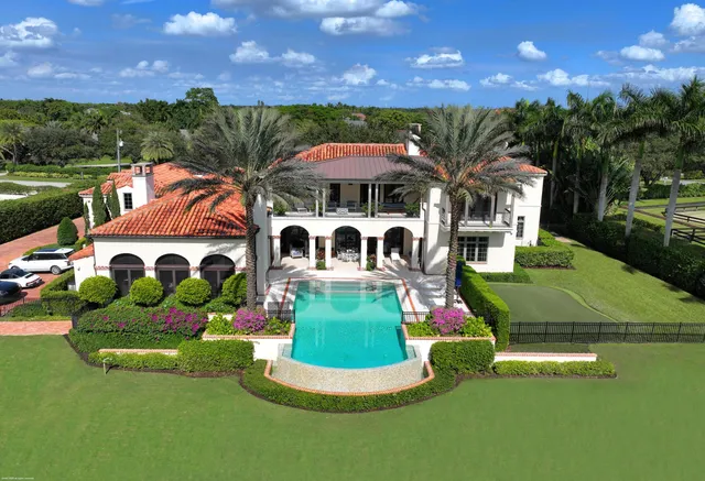 a view of swimming pool with a yard