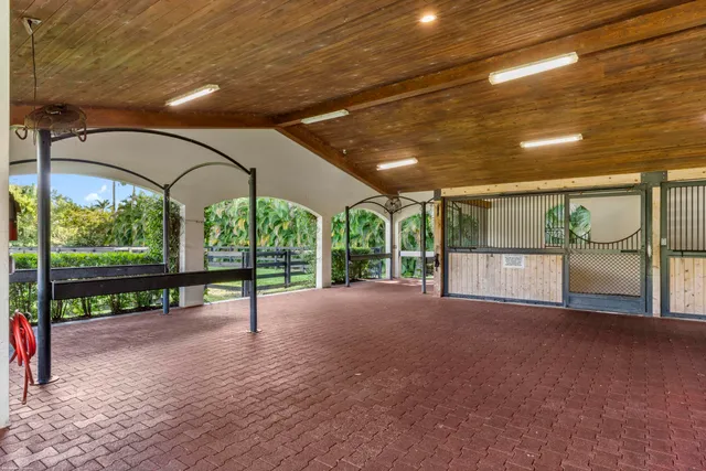 a view of a livingroom with furniture and a piano