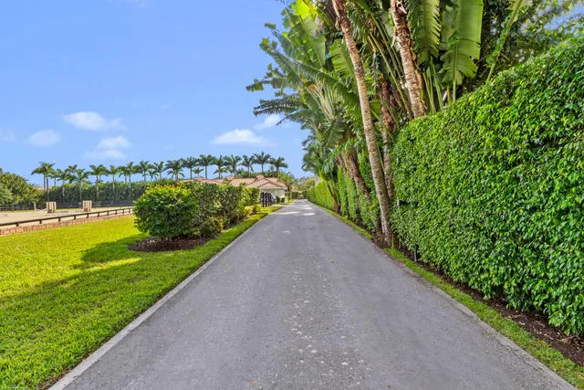 a living room with furniture fireplace and flat screen tv