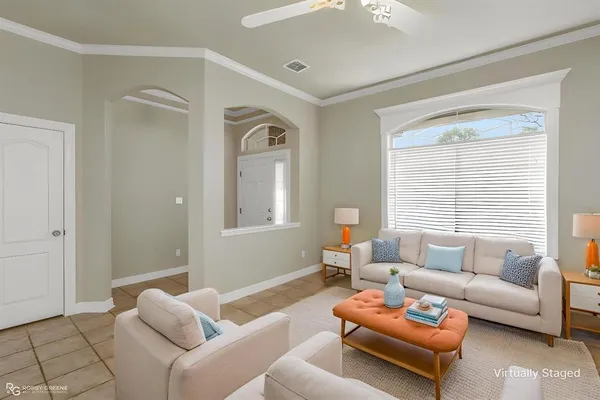 a view of a dining room with furniture window and outside view