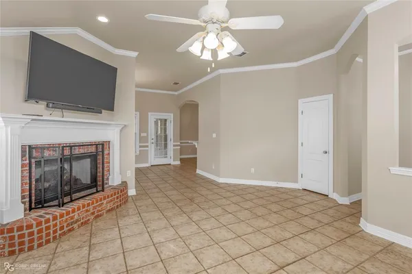 a kitchen with stainless steel appliances granite countertop a sink and a white cabinets