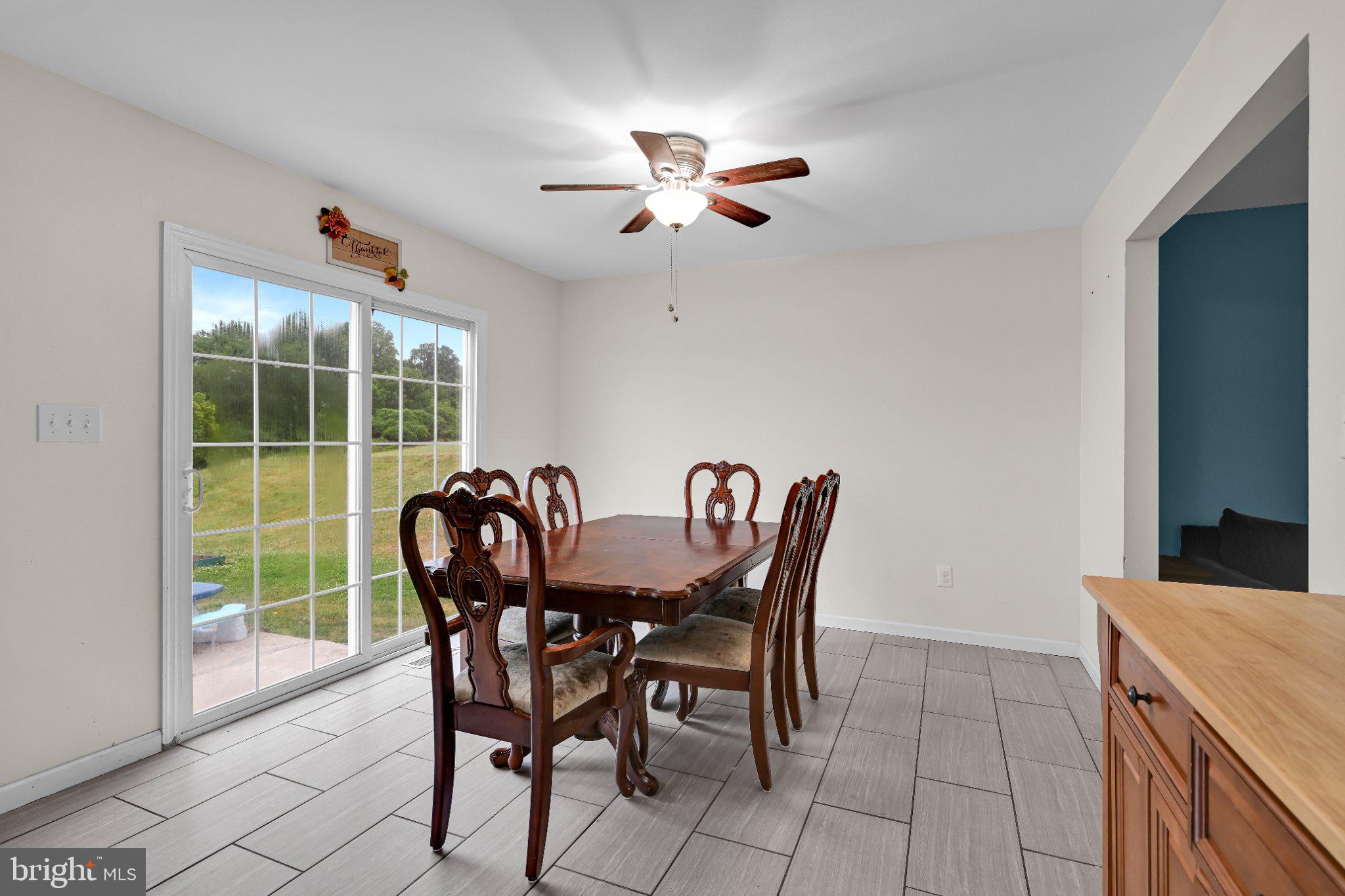 387 Oneida Drive Reading, PA 19608 - Photo 13 of 27 Bright dining space with outdoor view.