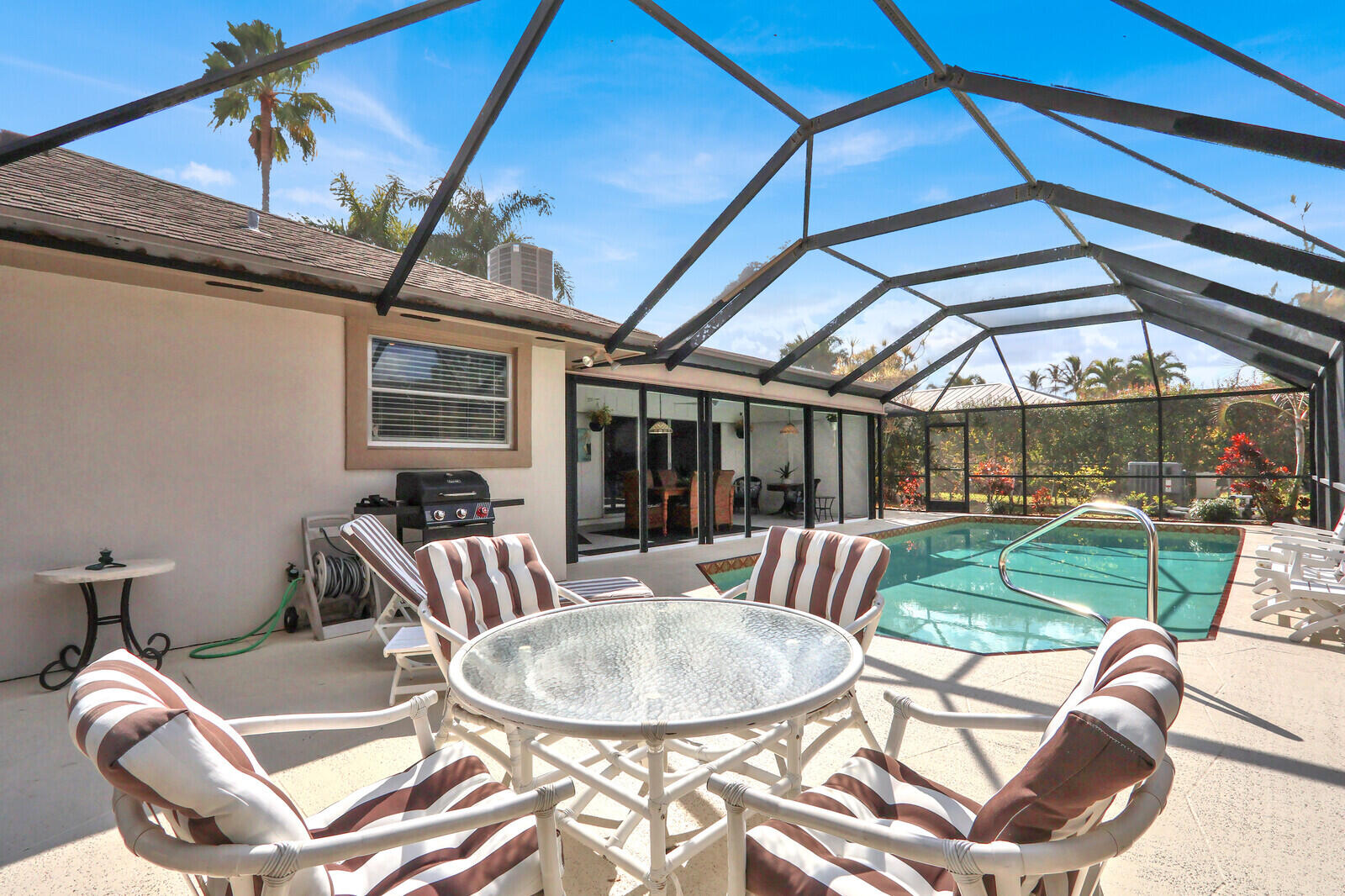 36 Saddleback Road Jupiter, FL 33469 - Photo 27 of 39 Screened Patio