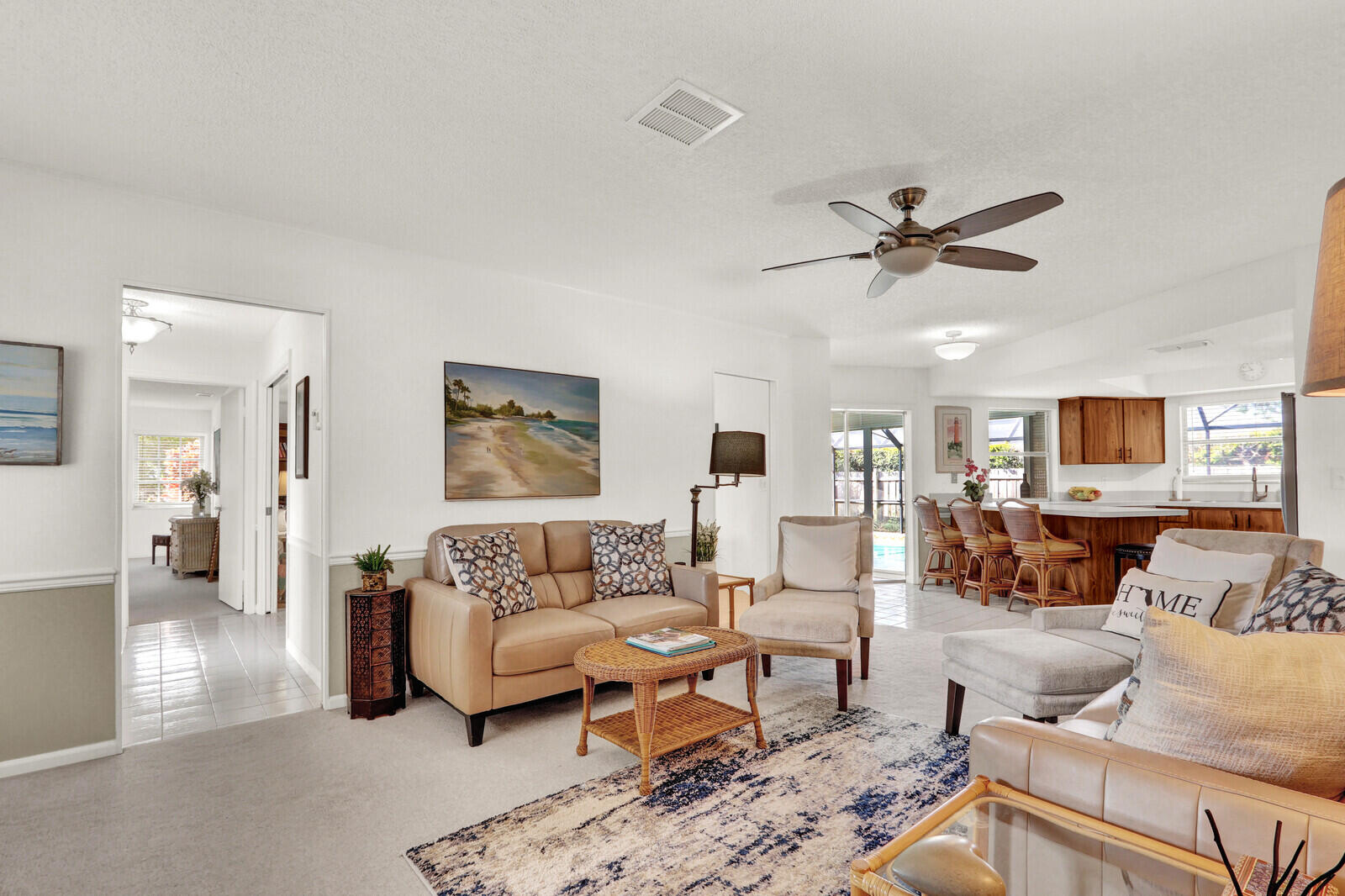 36 Saddleback Road Jupiter, FL 33469 - Photo 9 of 39 Family Room open to Kitchen