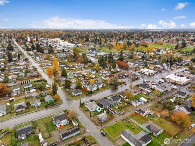 an aerial view of residential building with parking space