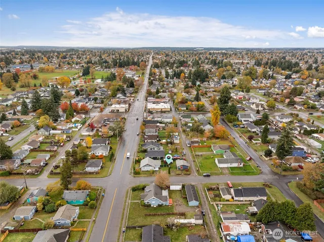 an aerial view of residential building with parking space