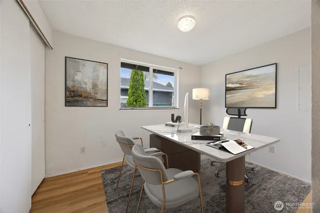 a workspace with furniture and window